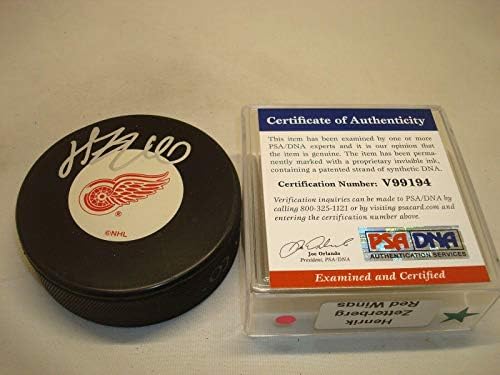 Хенрик Зеттерберг подписа автограф хокей на шайби на Детройт Ред Уингс PSA/DNA COA 1Б - за Миене на НХЛ с автограф